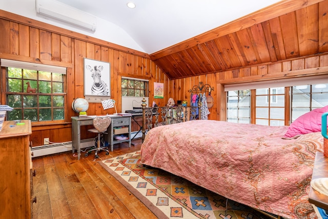 538 Wheelers Pt, Winchester, CT 06098 - bedroom featuring vaulted ceiling, a wall mounted AC, multiple windows, hardwood / wood-style flooring, and wood walls