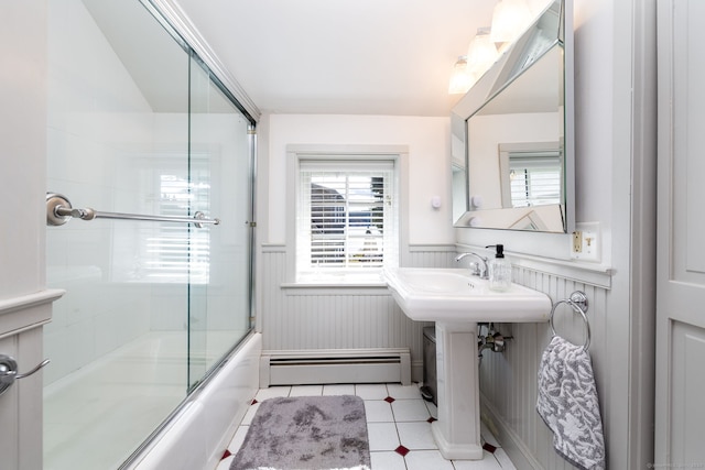 538 Wheelers Pt, Winchester, CT 06098 - bathroom featuring baseboard heating, tile patterned flooring, wainscoting, and shower / bath combination with glass door