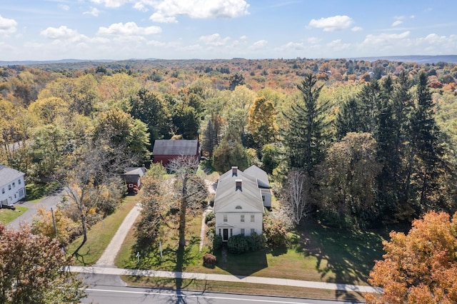 bird's eye view featuring a forest view