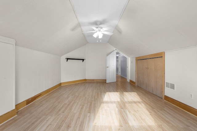 bonus room featuring ceiling fan, lofted ceiling, and light hardwood / wood-style floors