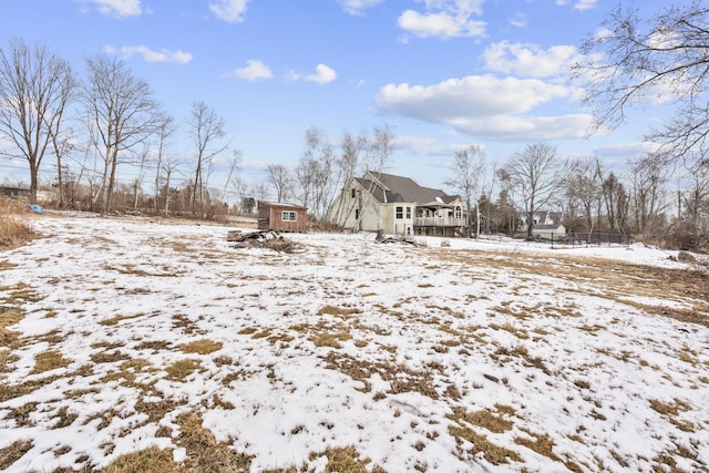 view of yard covered in snow