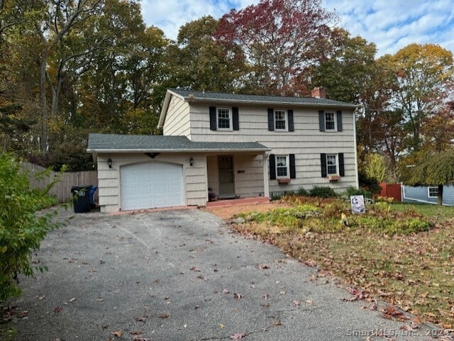 view of property featuring a garage