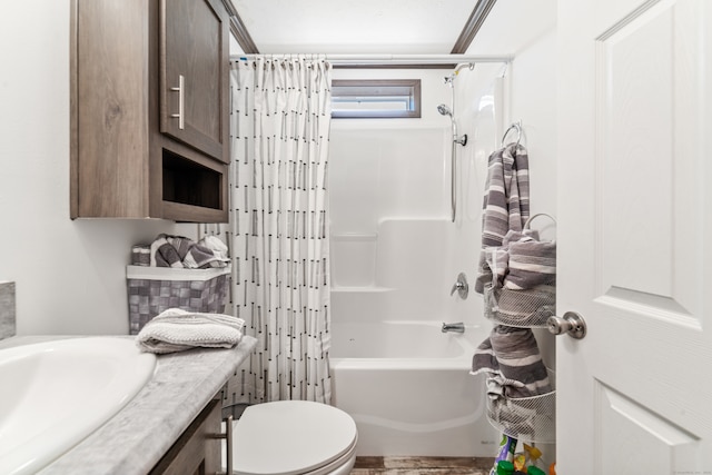 full bathroom featuring shower / tub combo, vanity, and toilet