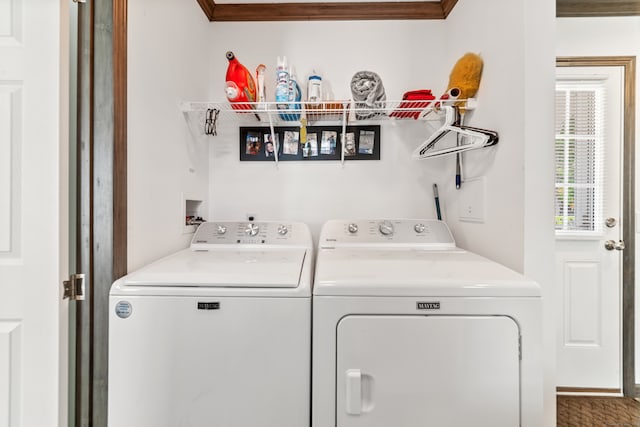 laundry room with washing machine and dryer