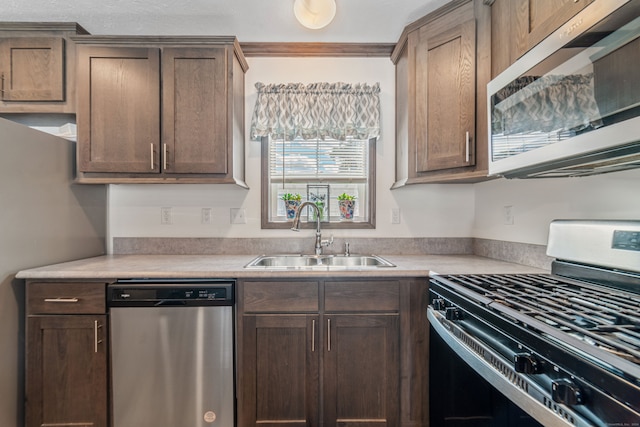 kitchen featuring appliances with stainless steel finishes and sink