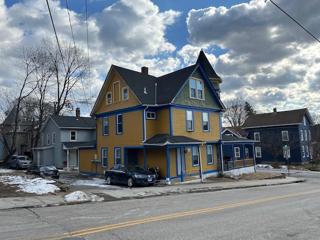 victorian-style house with covered porch