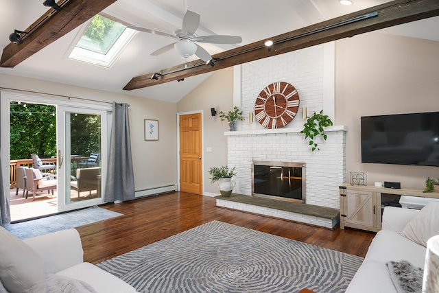 living area featuring dark wood-style floors, a baseboard radiator, a fireplace, and lofted ceiling with beams