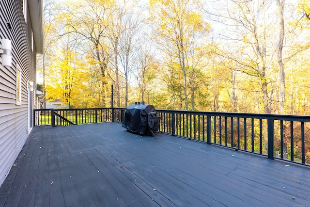 wooden deck featuring grilling area