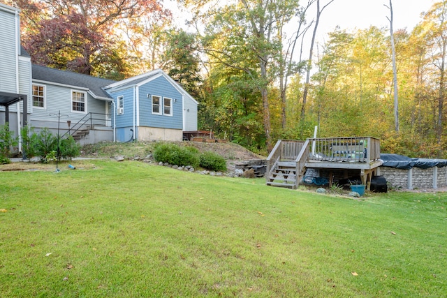 view of yard with a deck