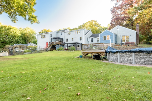 view of yard featuring a wooden deck