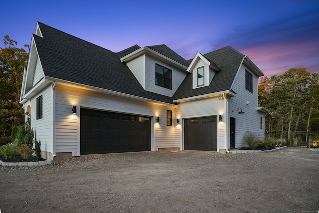 view of front of home with a garage