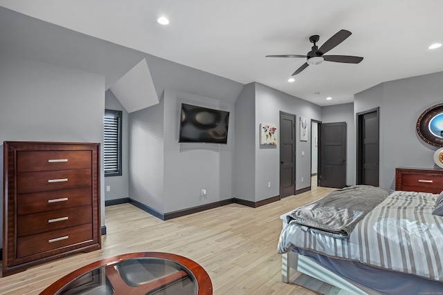 bedroom featuring ceiling fan and light hardwood / wood-style flooring