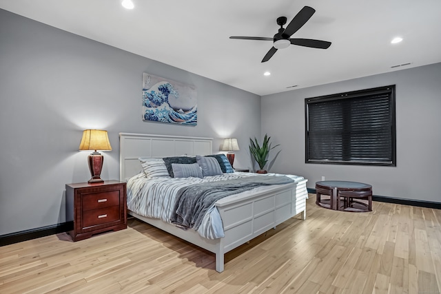 bedroom featuring light hardwood / wood-style flooring and ceiling fan