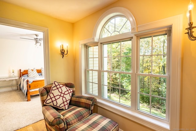 interior space with hardwood / wood-style flooring and ceiling fan