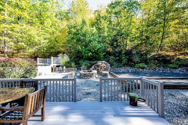 deck with a fire pit