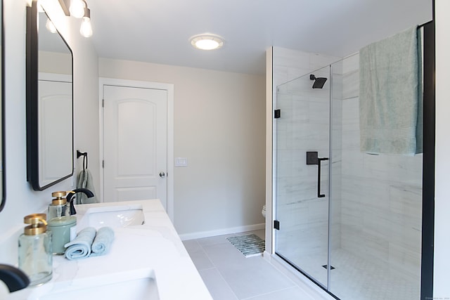 bathroom with vanity, toilet, an enclosed shower, and tile patterned flooring