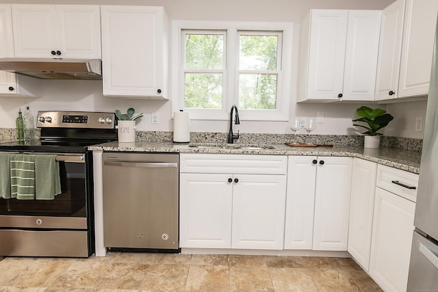 kitchen featuring sink, stainless steel appliances, and white cabinets