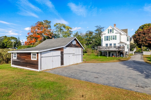 garage with a yard