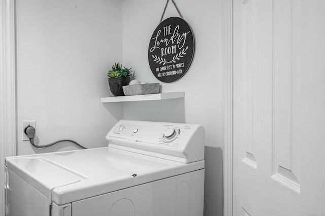 laundry area with independent washer and dryer