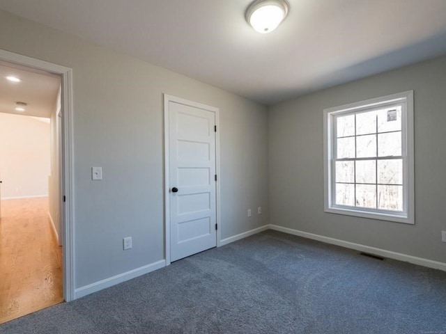 view of carpeted spare room