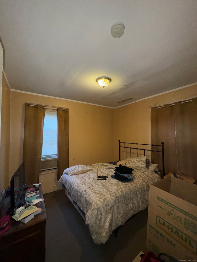 bedroom with ornamental molding