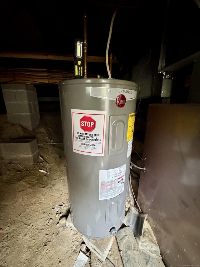 utility room featuring electric water heater