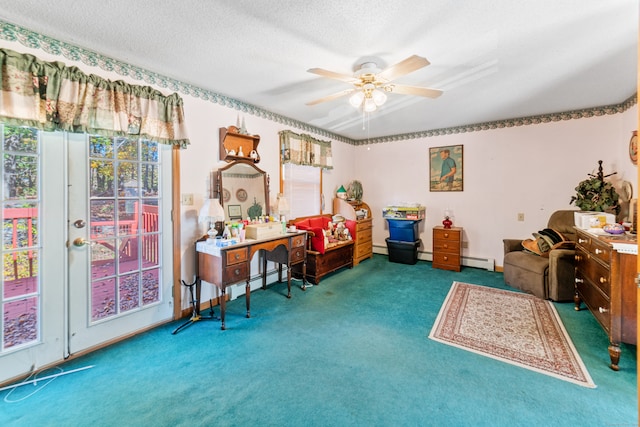 interior space with dark colored carpet, ceiling fan, a baseboard radiator, and a textured ceiling