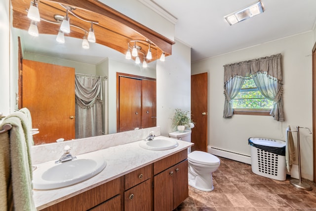 bathroom featuring vanity, baseboard heating, toilet, and curtained shower