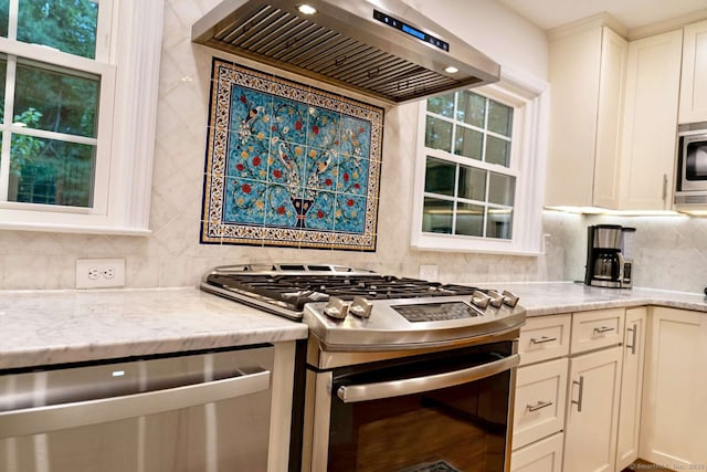 144 Hawks Hill Rd, New Canaan, CT 06840 - kitchen with appliances with stainless steel finishes, wall chimney exhaust hood, backsplash, and light stone countertops