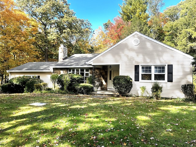 single story home with a front yard