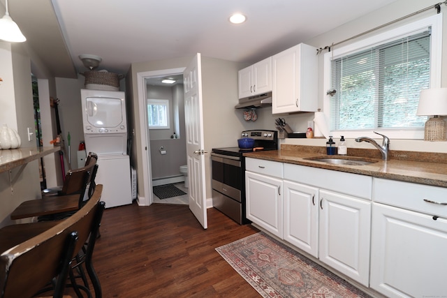 kitchen featuring white cabinets, sink, dark hardwood / wood-style flooring, stacked washer and dryer, and stainless steel electric range