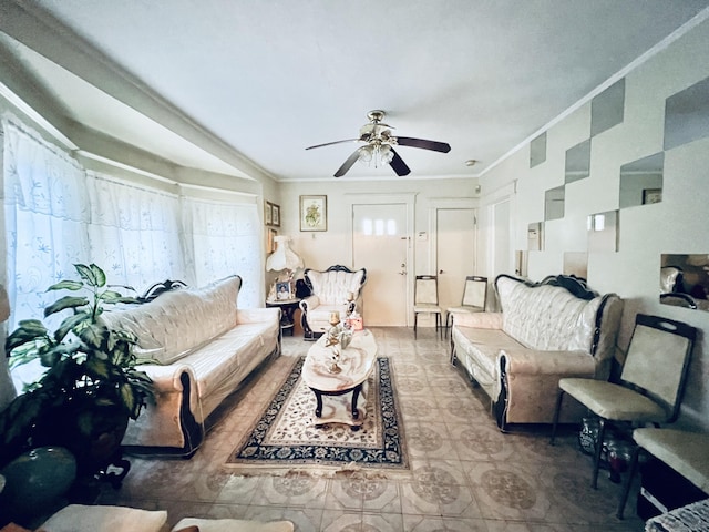 living room with ceiling fan and crown molding