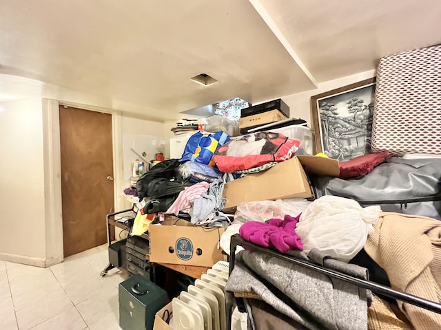 miscellaneous room with light tile patterned flooring