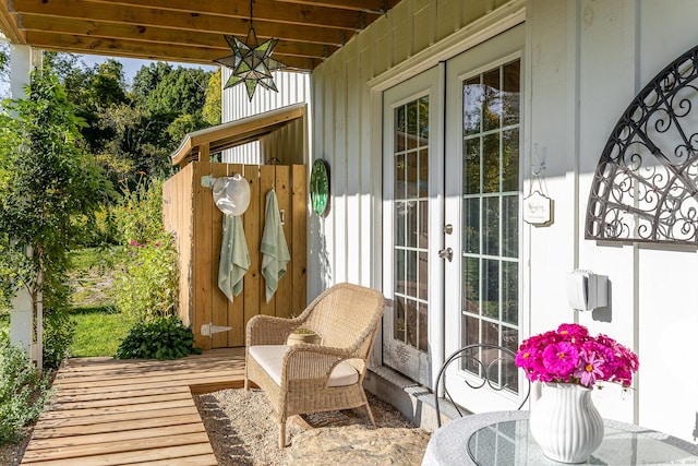 exterior space with french doors and a deck