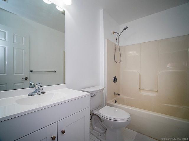 full bathroom with tile patterned flooring, tub / shower combination, vanity, and toilet