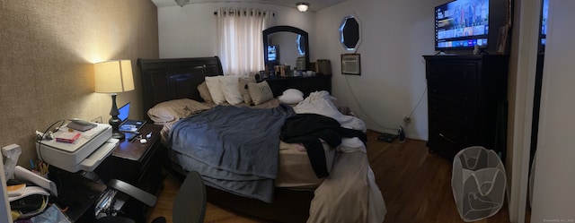 bedroom featuring wood-type flooring