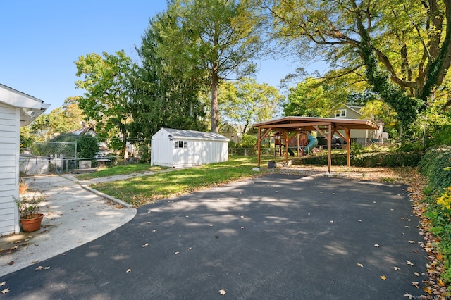 exterior space with a storage shed