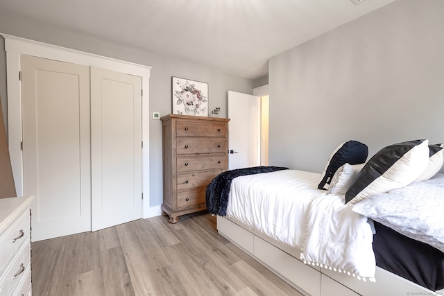 bedroom with light hardwood / wood-style flooring