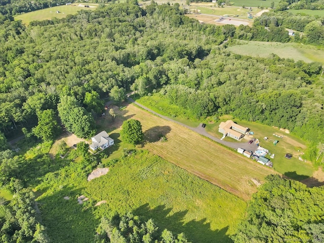 birds eye view of property with a rural view