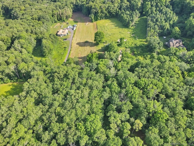 birds eye view of property with a rural view