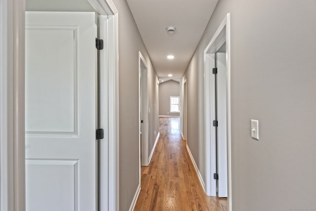 corridor featuring light wood-type flooring