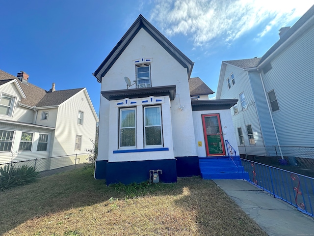 view of front of home with a front yard