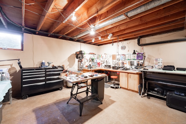 basement with a workshop area