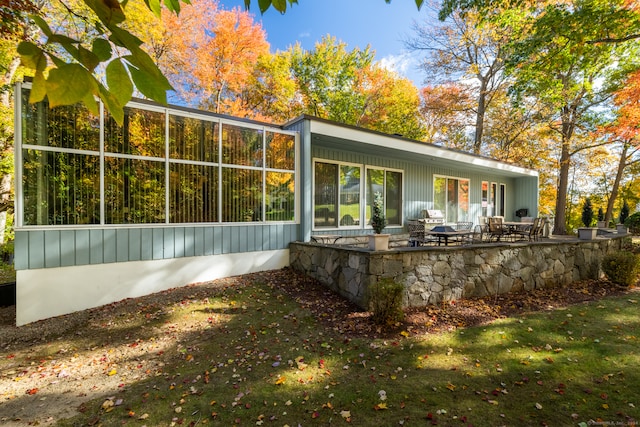 rear view of house featuring a patio area