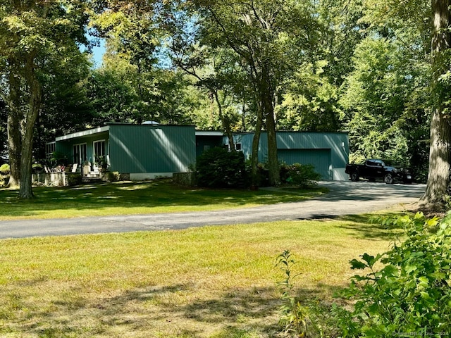 view of yard with a garage