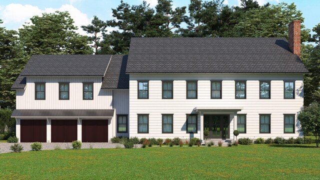 view of front facade featuring a garage and a front yard