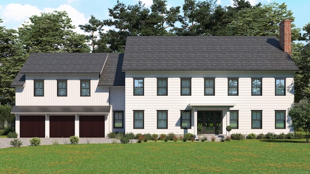 view of front of house featuring an attached garage, driveway, a chimney, and a front yard