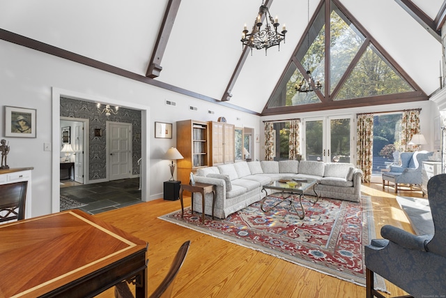 6 Tantummaheag Rd, Old Lyme, CT 06371 - living room featuring a chandelier, high vaulted ceiling, wood finished floors, and beam ceiling