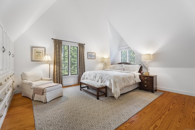 6 Tantummaheag Rd, Old Lyme, CT 06371 - bedroom with wood finished floors and high vaulted ceiling