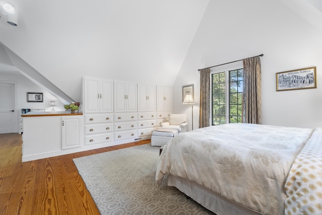6 Tantummaheag Rd, Old Lyme, CT 06371 - bedroom with wood finished floors and high vaulted ceiling